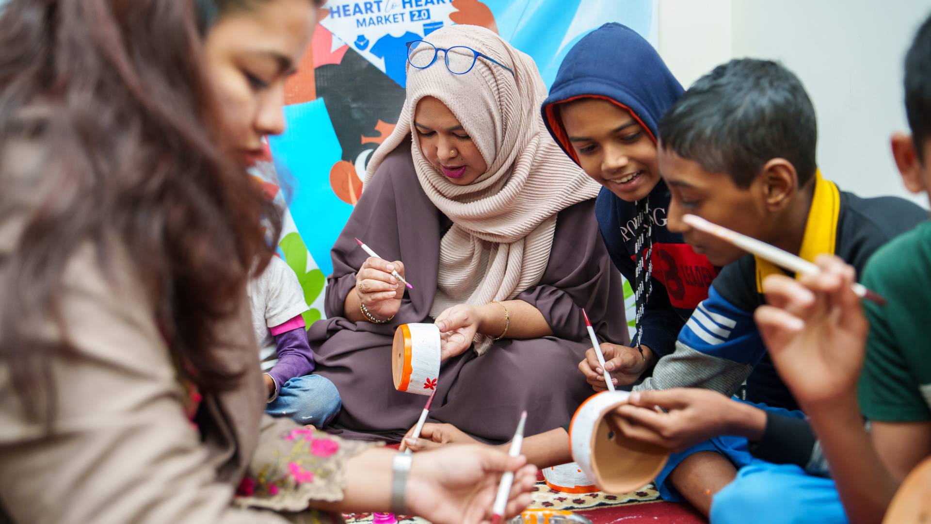 ইউবিএলের এমপ্লয়ীদের শিশুদের সাথে চিত্রাঙ্কন কার্যক্রমের আনন্দের মুহূর্ত