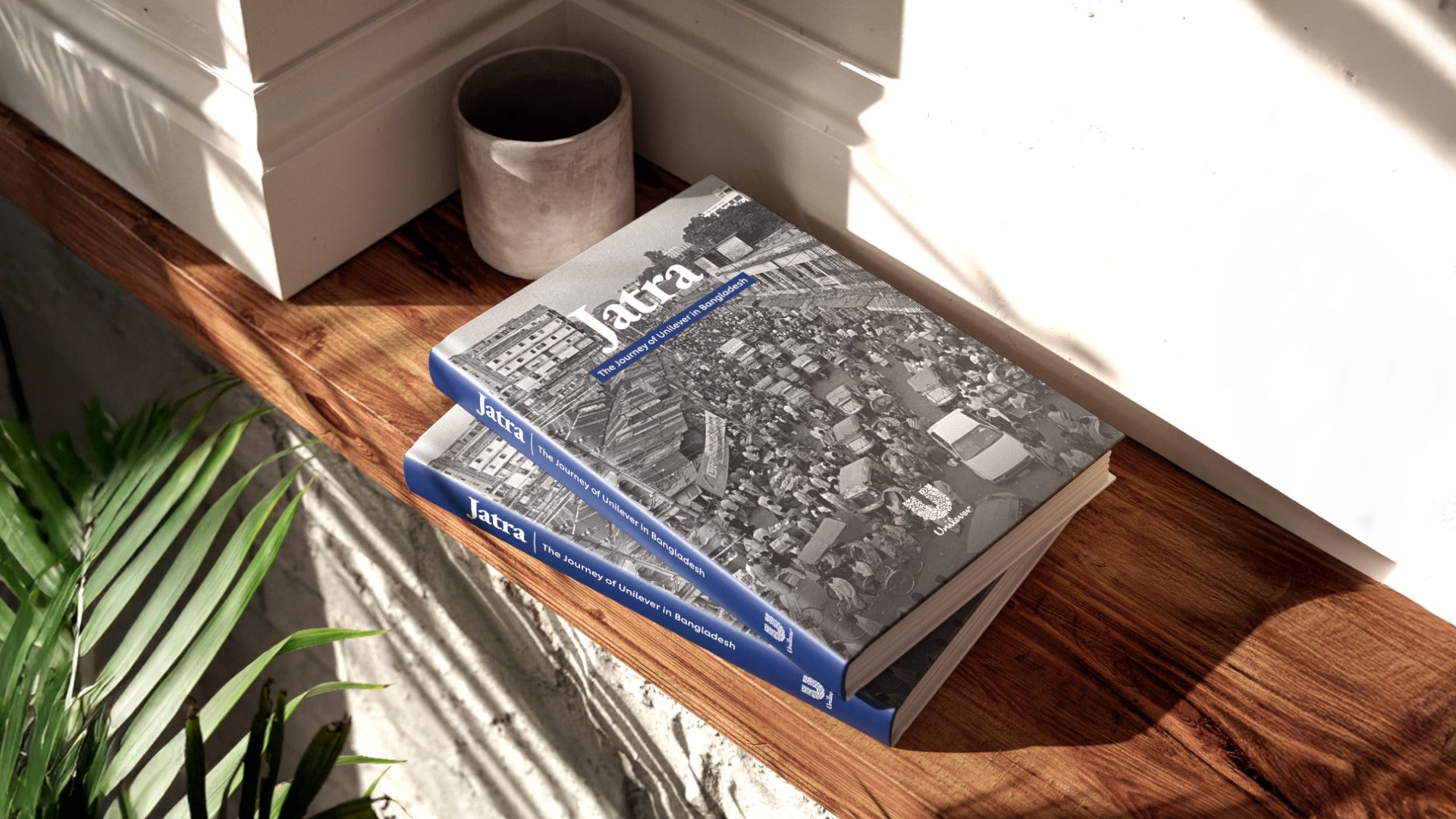 সাইড টেবিলে ৩টি যাত্রা বই রাখা